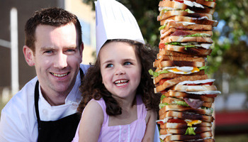 Food & Beverage Master Chad Byrne with his daughter, Lea Rose Byrne (5) before setting of the to compete in the Culinary Cup in Berlin.