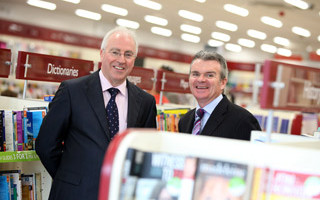 Eason franchisee Pacelli Lynch and Conor Whelan, managing director, Eason officially opening Pacelli Lynch’s new Eason franchise in Pearce Street, Mullingar last July.  The Mullingar store was the first in a series of four Eason franchises that opened last year in Balbriggan, Carlow and Kilkenny