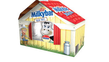 The Milkybar Milkybarn  contains a hollow milk chocolate egg and a Milkybar Cow