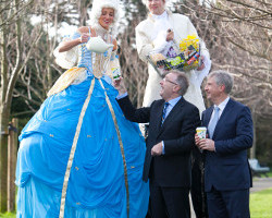 Pictured at the announcement of the ‘Mace Aiming Higher Strategy' are Leo Crawford, Group CEO, BWG Group and Willie O'Byrne, managing director, BWG Foods with stilt-walkers Jill Leckey and Drew Upton