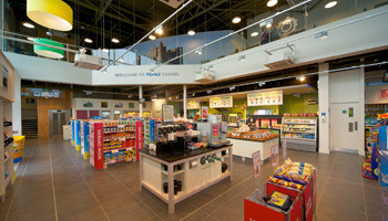 The interior of the award winning store features a double height ceiling and upstairs seating area