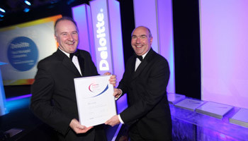 Jim Barry, MD of The Barry Group, accepting his award from Ger O’Mahoney, regional partner in charge, Deloitte and President of the Cork Chamber of Commerce