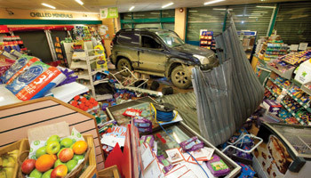 CARNAGE IN THE AILSES: McCullagh's convenience store at Bagenalstown suffered severe damage in the ram-raid, the goal of which was the shop’s Bank of Ireland ATM