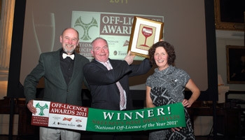 The NOffLA Off-Licence of the Year 2011 winner was Sweeney’s Wine Merchants, Glasnevin, Dublin. Kevin Simmons-Walsh, Finian Sweeney and Hannah Sweeney celebrate their win on the night