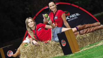 Models Sarah Morrissey and Baiba Gaile chilling out on bales of hay in St Stephen’s Green for the launch of Bicardi’s B-Live spectacular at Electric Picnic