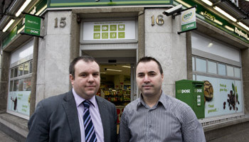 Musgrave territory manager Trevor Cannon and retailer Paul Cotter outside Cotter's Daybreak on Washington Street, Cork