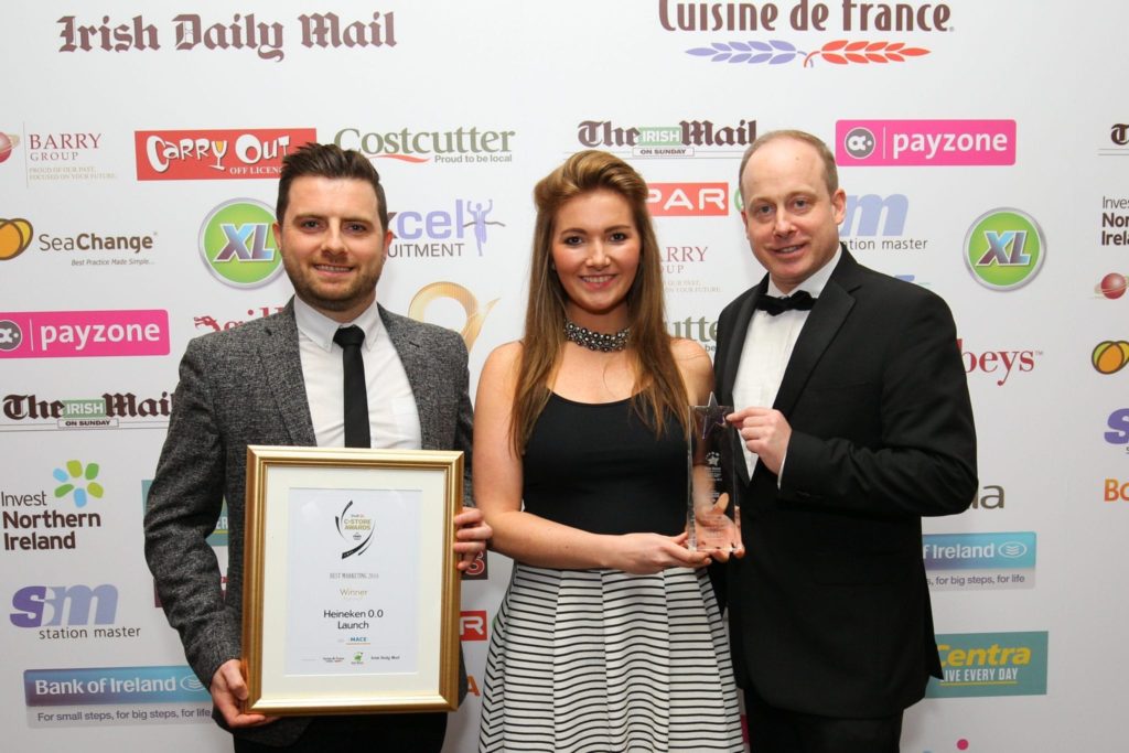 David Farragher and Lauren West receive the award for Best C-Store Marketing Campaign 2018 on behalf of Heineken 0.0%, presented by John Tully, regional manager, Mace